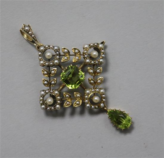 An Edwardian gold, peridot and seed pearl pendant brooch, 5.2cm drop